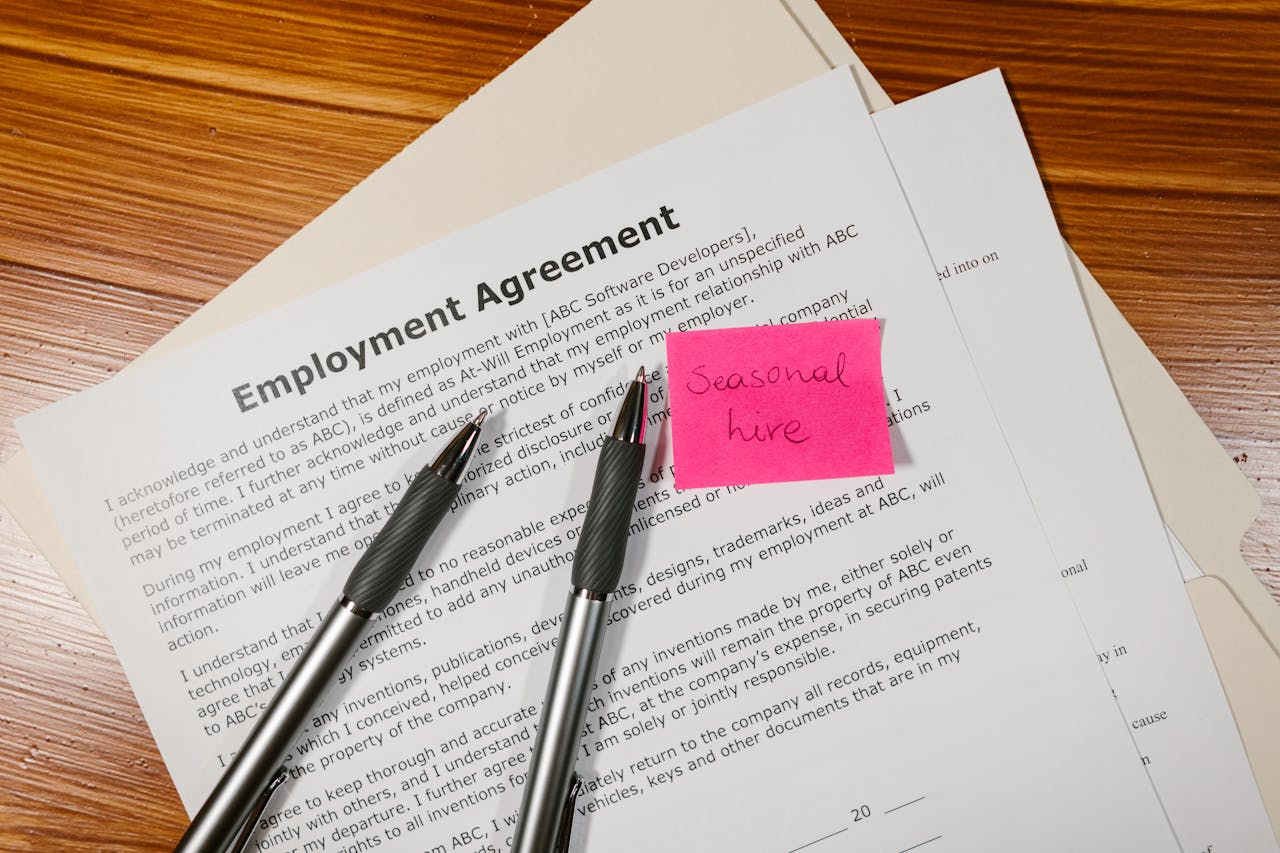 Employment agreement document with pen representing AI recruiting legal compliance under the EU AI Act