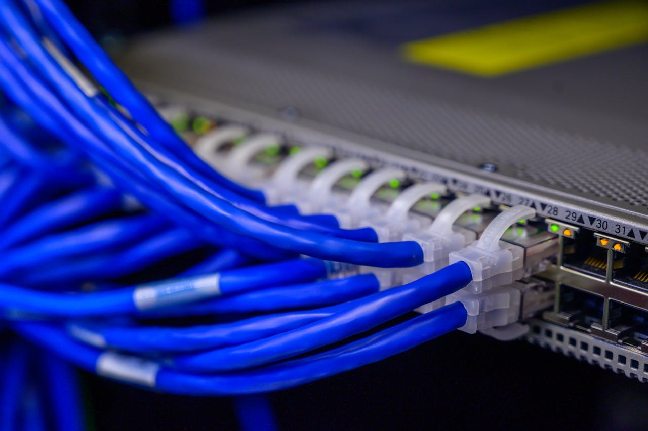 Ethernet cables plugged into server ports representing AI agent tool integration connections