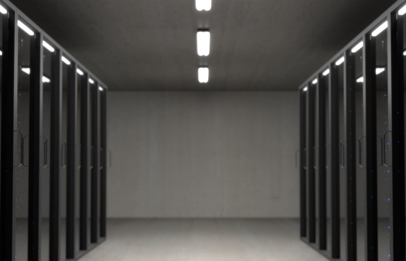 Server room corridor with server racks representing Windows 365 cloud PC infrastructure for AI agents